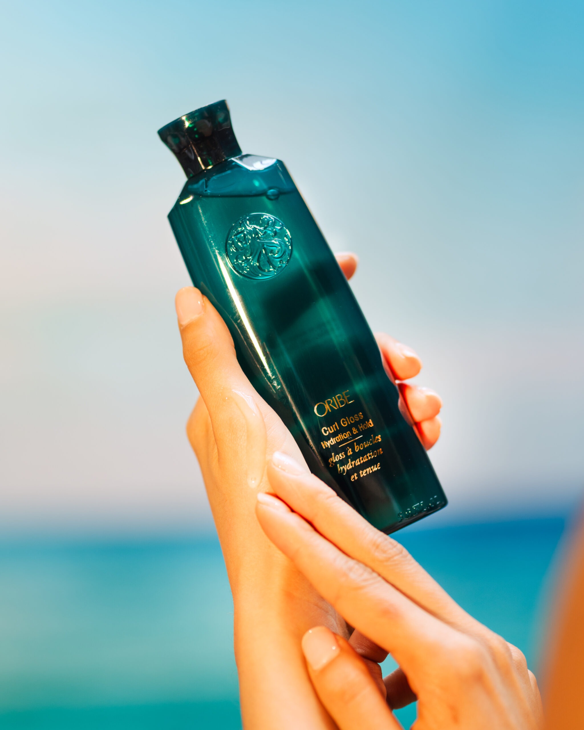 BSK08098 Oribe Curl Gloss lightweight styling gel ideal for low porosity curly hair with water-based, hydrating ingredients